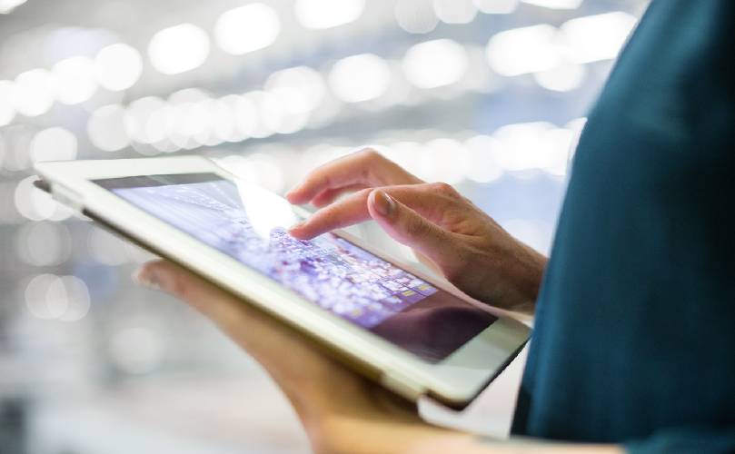 close-up of a person using a tablet