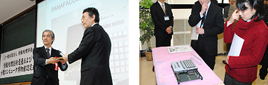 左画像は認定証を受ける（株）PFU 中村執行役員、右画像は当日展示された PANAFACOM Lkit-16