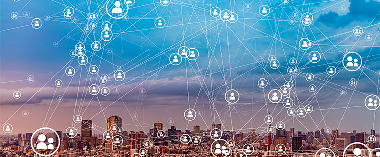 Cityscape with a network of interconnected people icons overlaid, representing connectivity and communication.