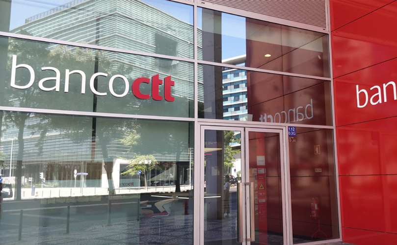 The outside of a Banco CTT building that reads 'banco ctt' in its window