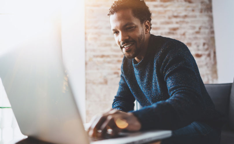 Person working on a laptop.