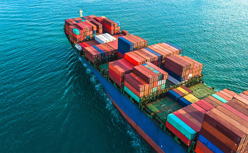 A ship near a port going out into the sea