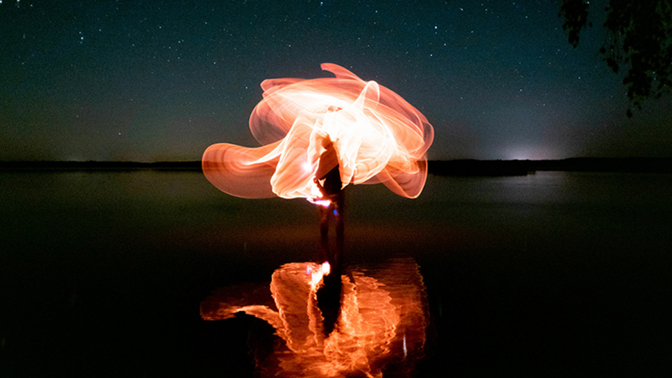 Orange abstract image reflected on water