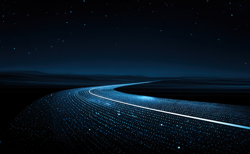 Image of a winding road at night