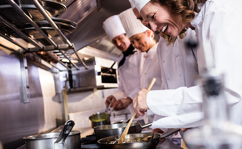 Picture of chefs cooking in a kitchen