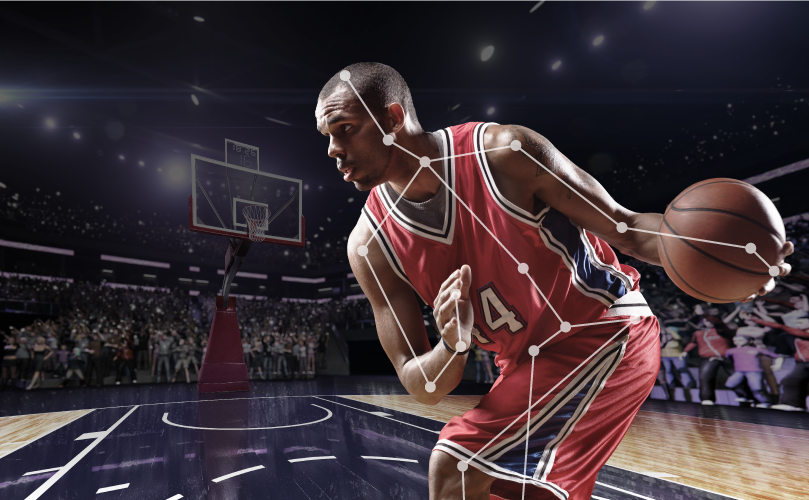 バスケットで試合を行う一人の男