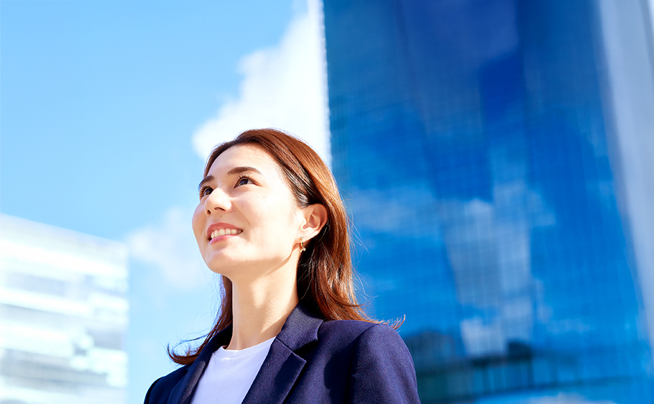 Image for Asian businesswoman with a focused expression.