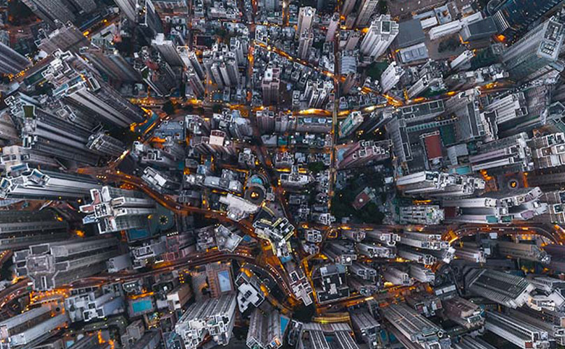 A shot taken from above of a city with buildings