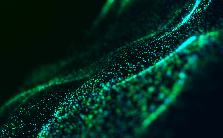 ビッグデータのコンセプトをエメラルド色のドットと未来的な波で表した、抽象的なテクノロジーの写真