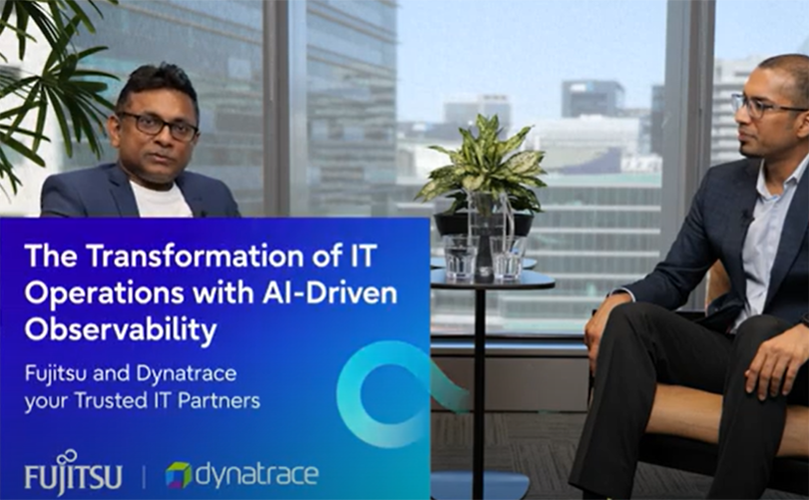 ภาพของ Charles Ponniah (Fujitsu) กำลังนั่งสนทนากับ Nik Jain (Dynatrace)