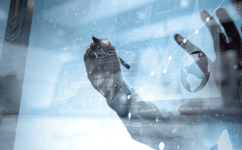 Hand interacting with data on a futuristic display