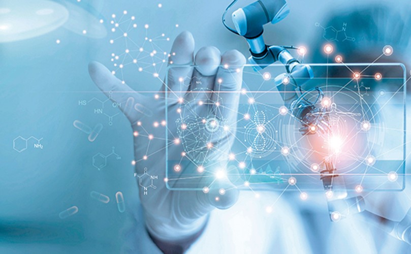 A hand holding a device