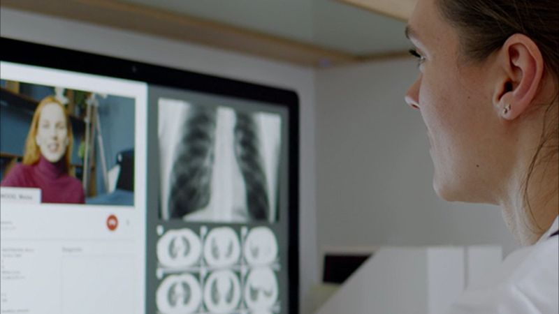 Medical professional discussing xrays via video