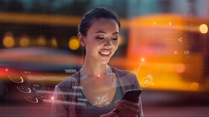 young woman reviewing data smartphone depicting Enhanced User Experience