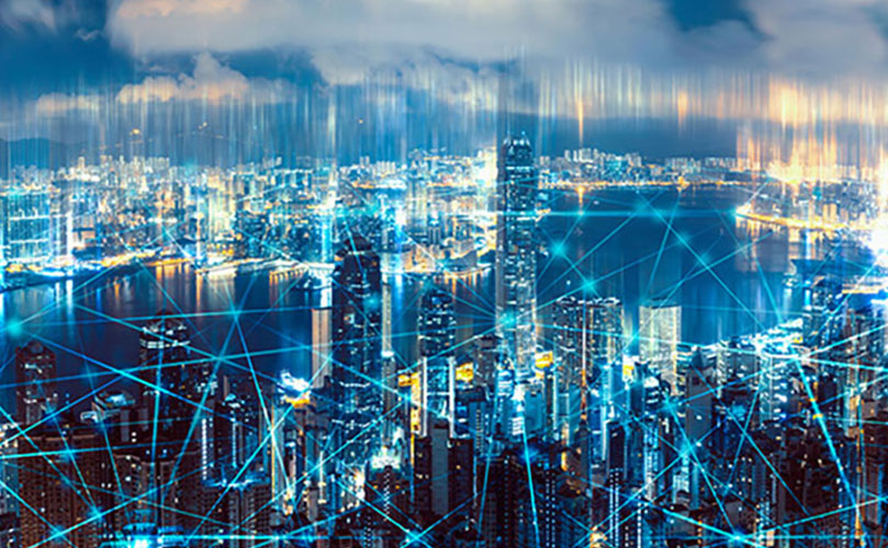 A futuristic city skyline with illuminated buildings and a web of interconnected lines symbolizing digital connectivity and smart technology within the urban landscape.