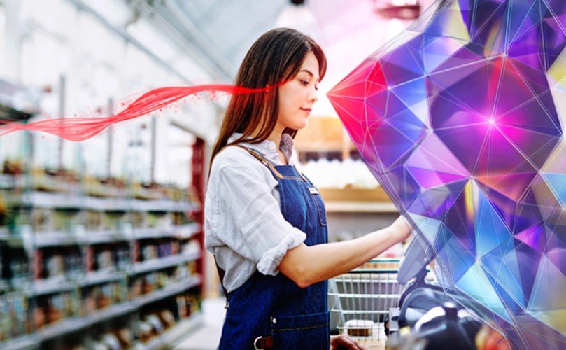 A woman in a supermarket wth an illustration next to her