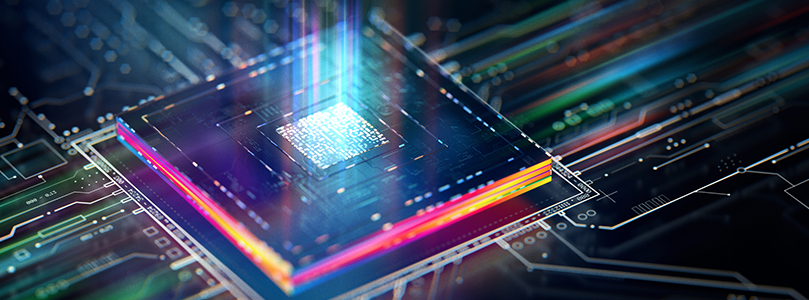 A computer chip emitting colorful light