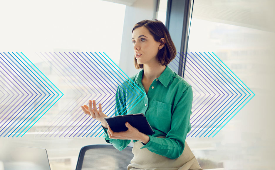 A man in a business suit holding a smartphone and looking towards the future.