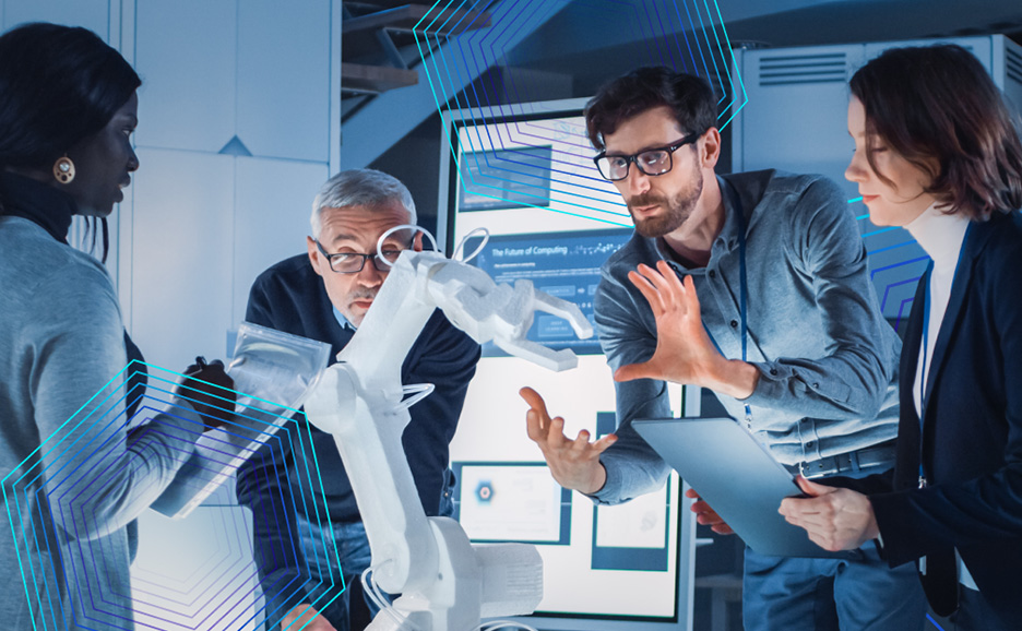 研究室でロボットアームを囲み、議論する多様なエンジニアのチーム