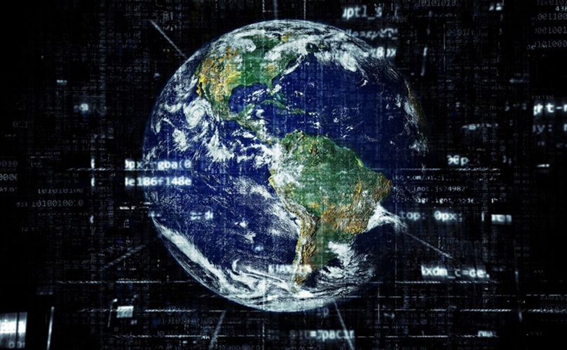 Earth with digital code overlay.