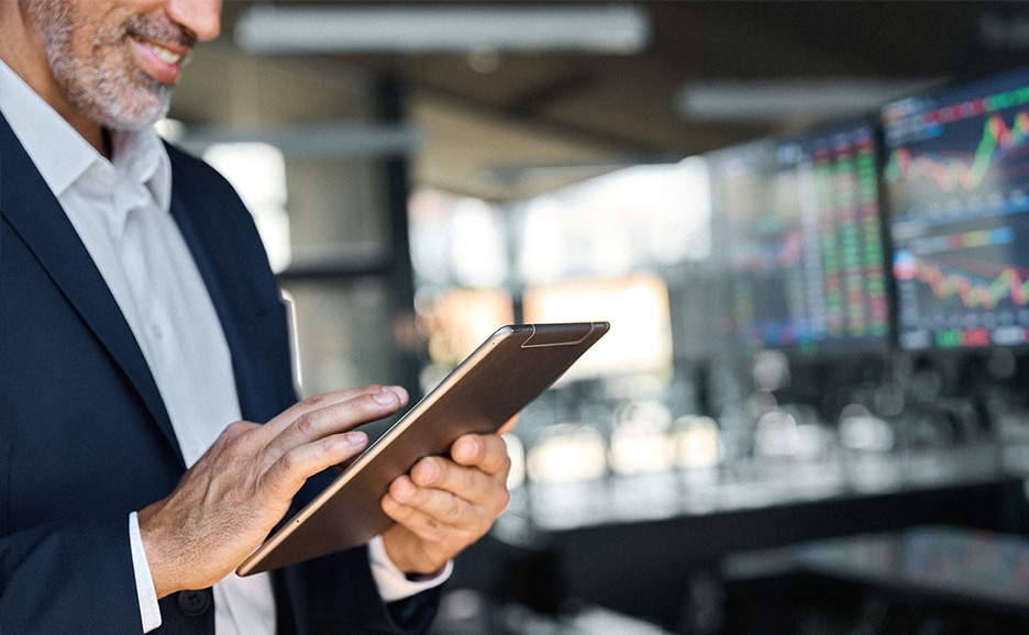 Man operating a tablet