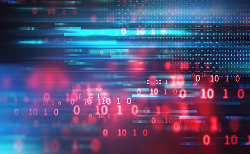 デジタルデータの流れを表す抽象的な背景画像。赤と青のバイナリコードが流れるように表示されている。								