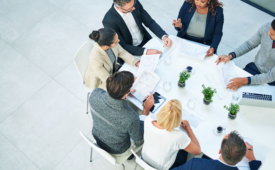 men and women in meetings