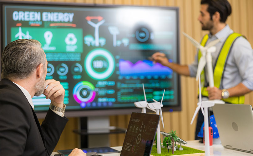 Team of engineers discussing data in a meeting room