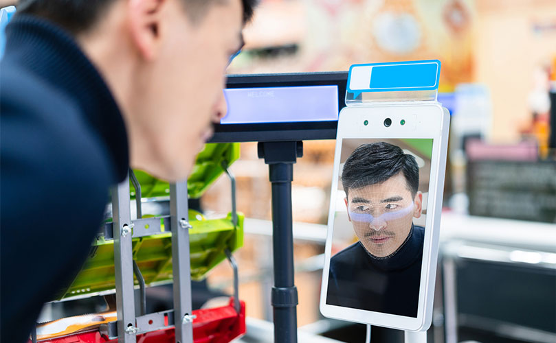 Man performing facial recognition