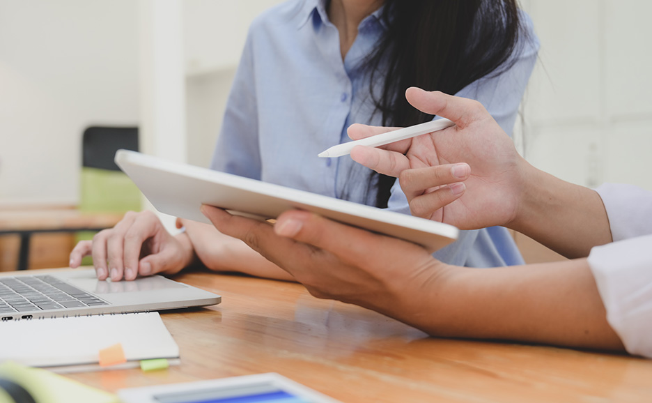 the hands of tablet-based strategy