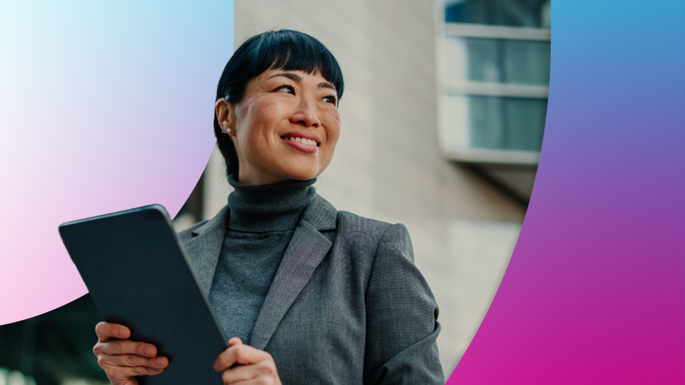 A woman holding a device depicting technical assessments and uplifts