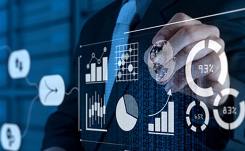 A businessman utilizing a tablet to sketch graphs and diagrams, emphasizing data representation in a work setting.