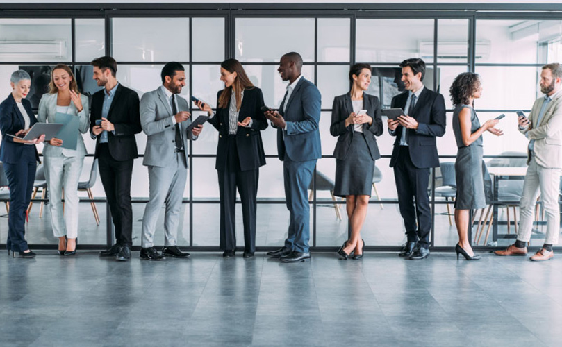 Businessmen using digital devices