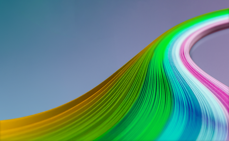 鮮やかなグラデーションカラーの曲線が流れる抽象背景