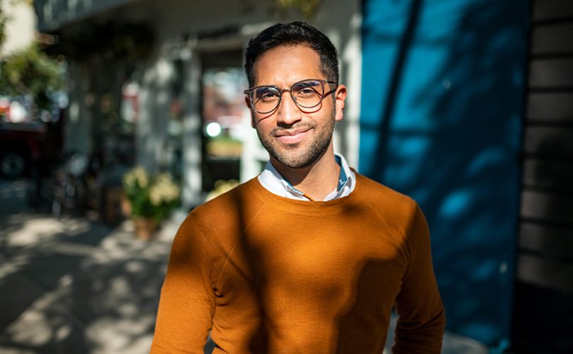 A man smiling at the camera