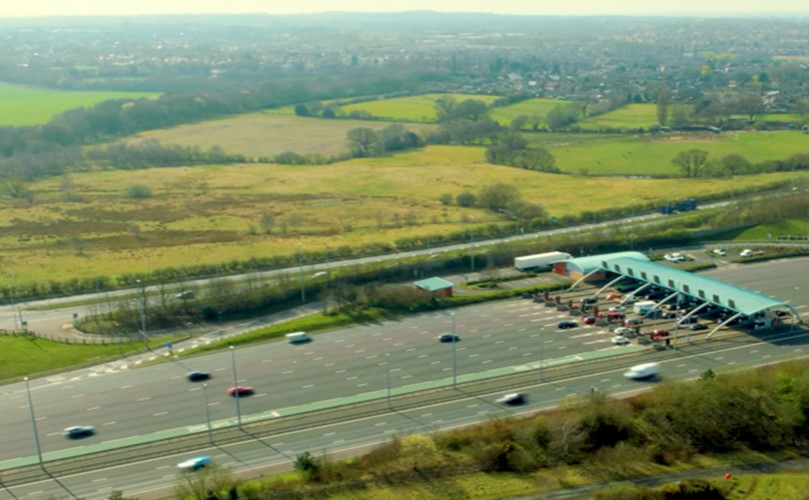 A road with cars moving in it