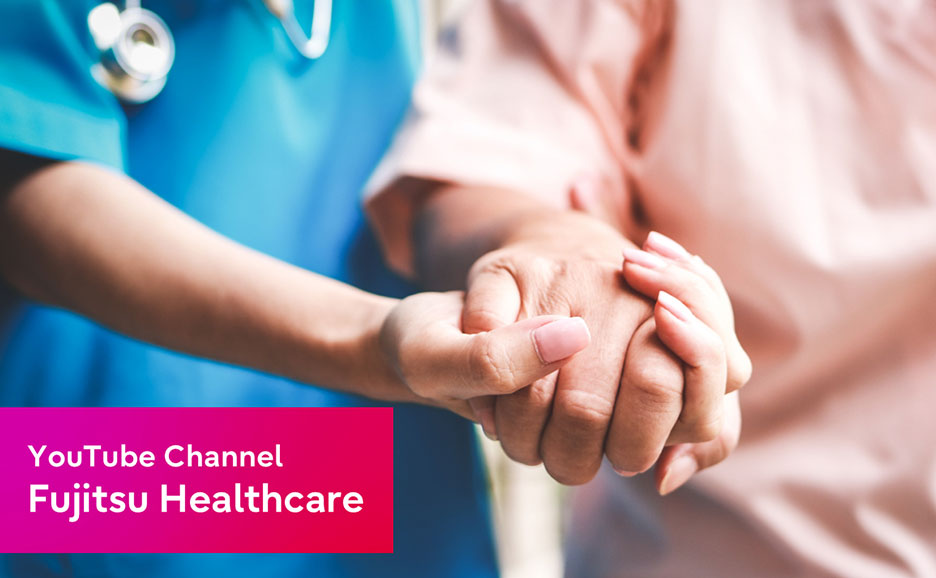 握手をしている医師と患者の手元