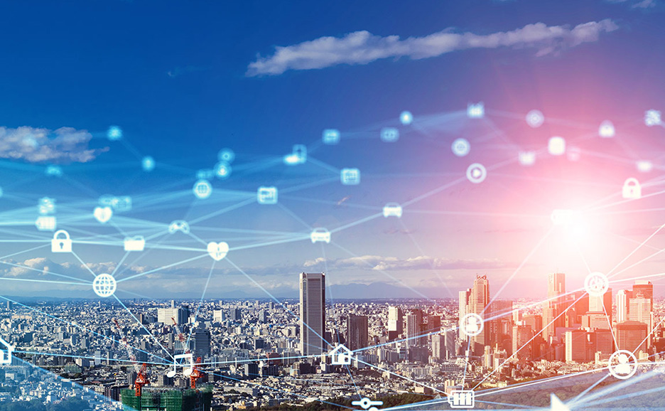 IoTやクラウドコンピューティングに関連するサービスと夜景の都市を結びつける未来のネットワークイメージ。