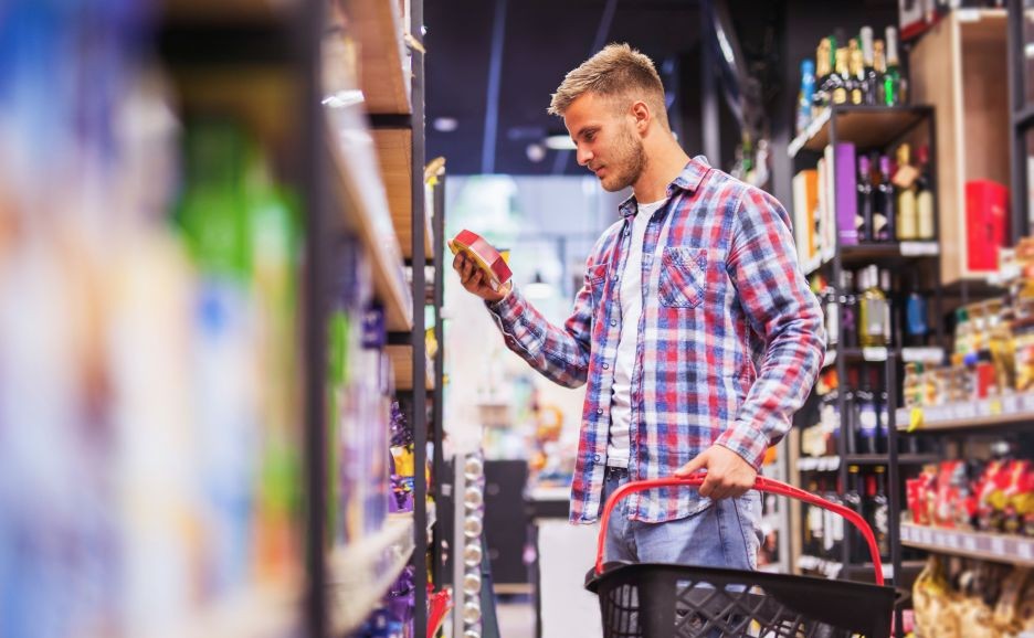 A man selecting items at the supermarket