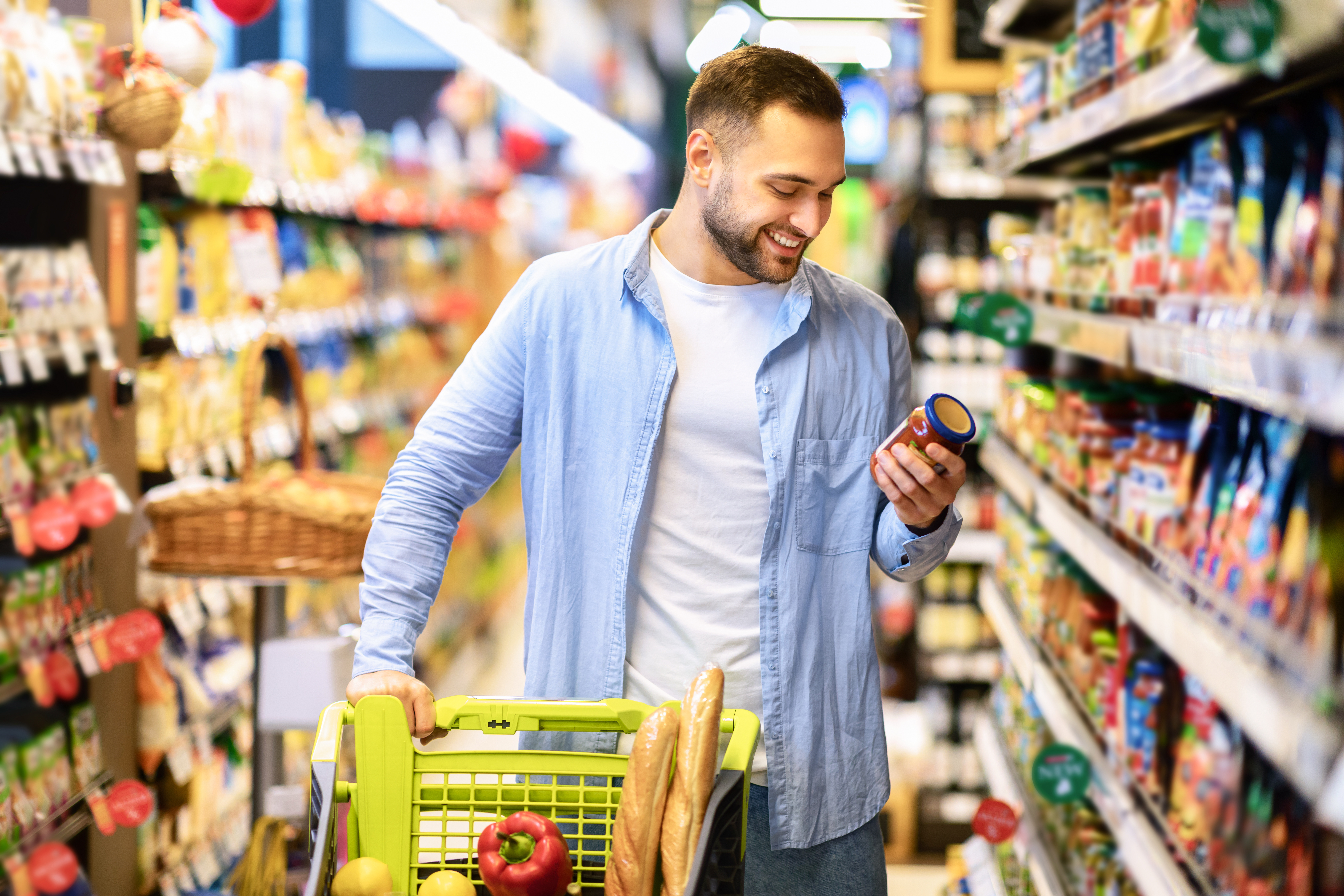 A man checking product labels at a supermarket