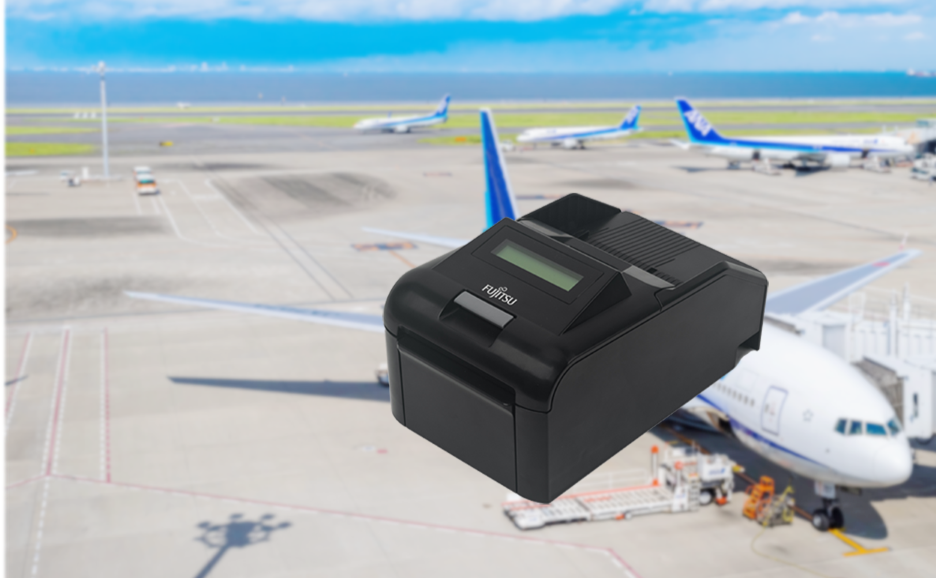 空港にとまる旅客機を背景に浮かぶFujitsu Printer 9890Cの商品画像