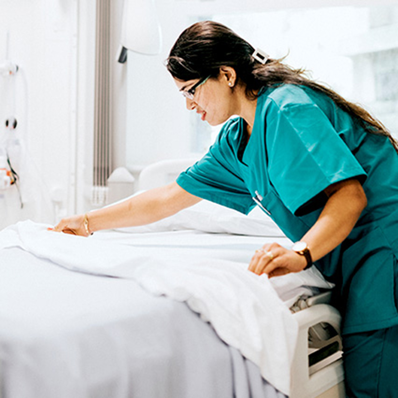 Healthcare workers who make beds