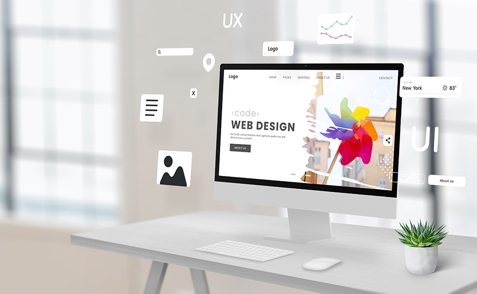 デスク上のモニターにウェブサイトが映され、仮想のアイコンが浮かぶ