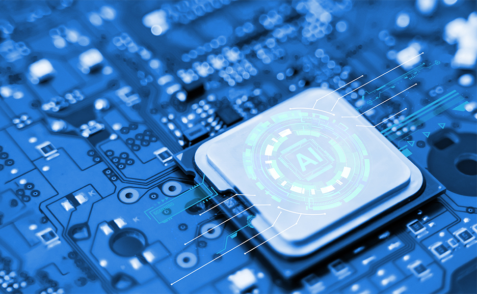 A close-up photo of a blue circuit board embedded with a microchip displaying the letters "AI."