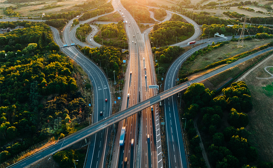 a highway with cars on it
