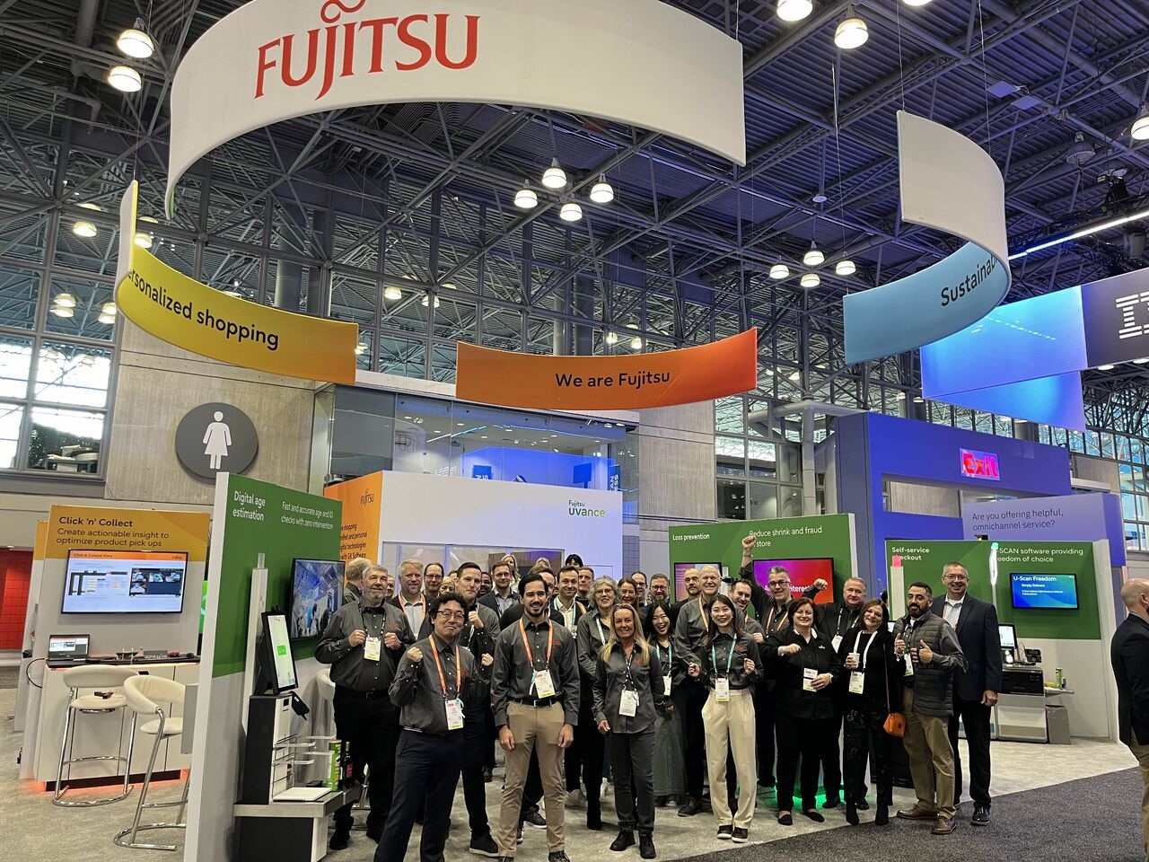 At an international exhibition with Fujitsu colleagues