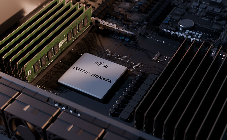 マザーボードに設置されたCPUと緑色のRAMモジュールが並んでいる。