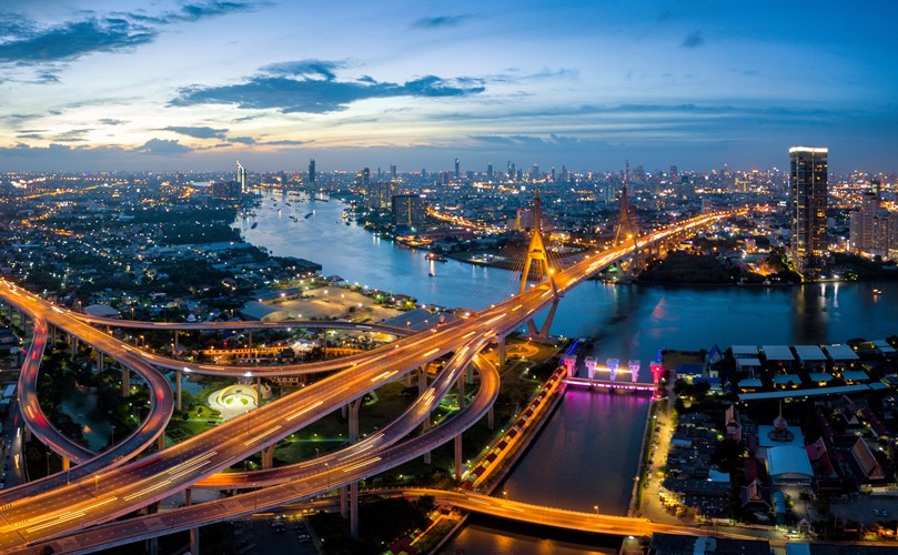 A picture of a city with an evening sky showing several cross roads and bridges.