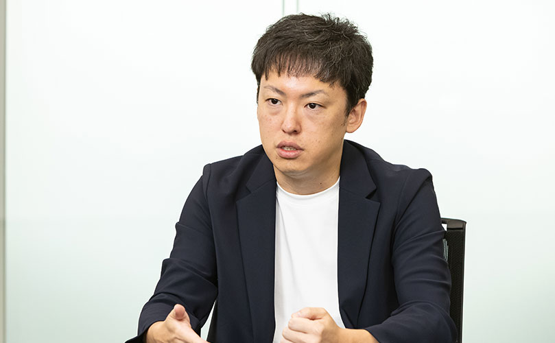 Scene from an interview showing Takeshi Sato, Lead of Security Consulting, Uvance Wayfinders, Fujitsu Limited