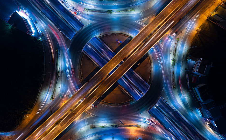 At a night interchange, orange highways and blue general roads intersect.